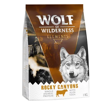 Wolf of Wilderness Elements Rocky Canyons, single animal protein con aloe vera, confezione da 1 kg. Testo visibile: Rocky Canyons, single animal protein, with aloe vera, 1 kg.