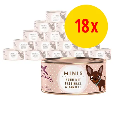 Lot de 18 boîtes Canis Minis Huhn mit Pastinake & Kamille, illustration de petit chien sur l’étiquette. Texte en allemand visible sur les boîtes.