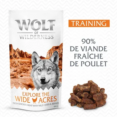 Wolf of Wilderness Explore the Wide Acres, Training, 90 % de viande fraîche de poulet, morceaux visibles, sachet 100 g. Texte en anglais : Fresh chicken meat with wild herbs & berries.