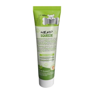 Tub med texten 'HEMP SQUEEZIE', 100 g. Näringsanalys: råprotein 4,1 %, råfett 12,2 %. Innehåller malt, oljor och fetter, hampa, lavendel. Bild på hund och streckkod synlig.