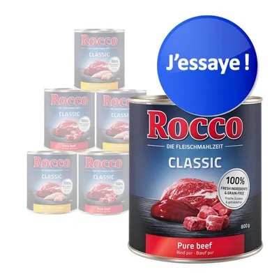 Conserve Rocco Classic Pure beef 800 g, texte visible : 100 % fresh ingredients & grain-free, J’essaie ! Plusieurs variantes Rocco Classic en arrière-plan.