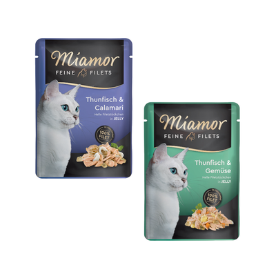 Miamor Feine Filets Thunfisch & Gemüse in Jelly, confezione da 24 buste da 100 g ciascuna, immagine di gatto bianco e filetto con verdure visibili sulla confezione.
