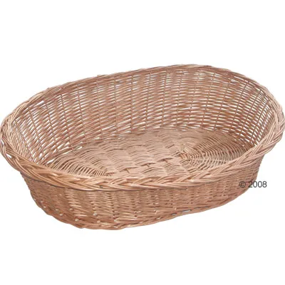 Cesta ovalada de mimbre trenzado, sin cojín ni accesorios visibles. Material: mimbre natural. Vista del interior y los bordes elevados.