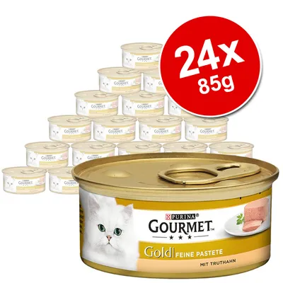 Purina Gourmet Gold Feine Pastete mit Truthahn, 24x85g tins. Image shows multiple gold tins with white cat and product label, large red circle with '24x 85g' text.