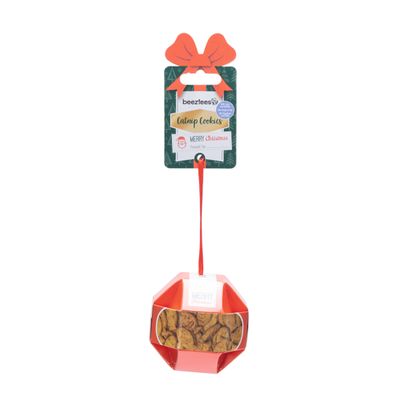 Beeztees Catnip Cookies, Weihnachtsverpackung mit roter Schleife und Aufschrift 'Merry Christmas', Sichtfenster zeigt Keksinhalt.