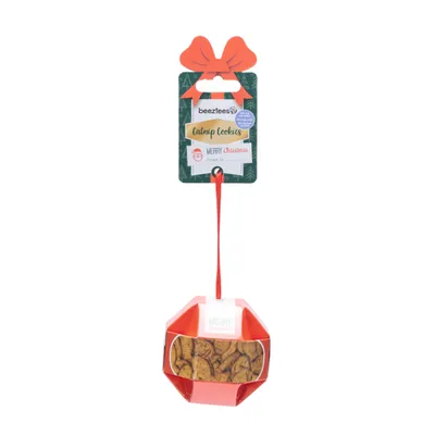 Beeztees Catnip Cookies, Weihnachtsverpackung mit roter Schleife und Aufschrift 'Merry Christmas', Sichtfenster zeigt Keksinhalt.