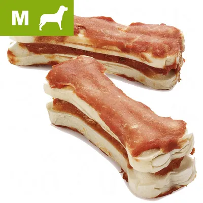 Två tuggben med rödbrunt köttöverdrag, storlek M markerad med grön ruta och vit hundsilhuett uppe till vänster. Två tuggben med rödbrunt köttöverdrag, storlek M markerad med grön ruta och vit hundsilhuett uppe till vänster.