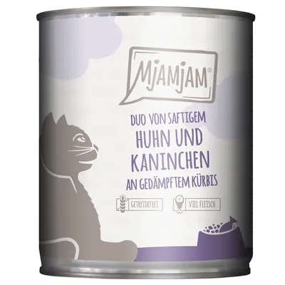 Mjamjam Duo von saftigem Huhn und Kaninchen an gedämpftem Kürbis, mentions visibles : getreidefrei, viel Fleisch. Texte en allemand.