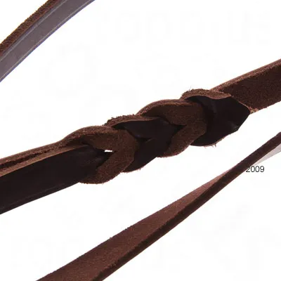 Close-up of a brown braided leather strap showing the texture and plaited design detail.