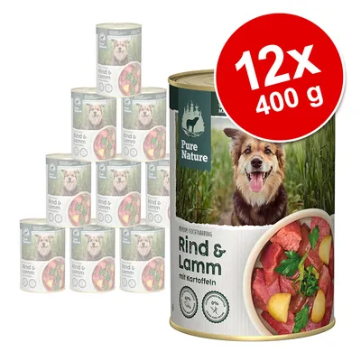 Pure Nature Rind & Lamm mit Kartoffeln konzerv, 12×400 g. Kutya képe és húsos-zöldséges étel a dobozon látható.