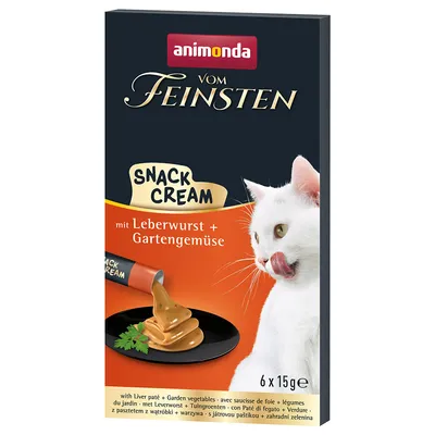 Animonda vom Feinsten Snack Cream z pasztetem z wątróbki i warzywami ogrodowymi, opakowanie 6 x 15g. Przedstawiono: biała kotka i kremowy przysmak na czarnym talerzu.