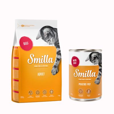 Smilla Adult torrfoder med texten 'Beef' och Smilla våtfoderburk med texten 'Poultry Pot', båda med bild på katt. Röd procent-symbol visar rabatt eller erbjudande.