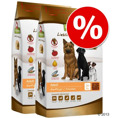 Kaksi GranataPet Liebli Adult Geflügel/Chicken -koiranruokapussia, edessä suuri punainen prosenttimerkki. Pakkauksissa koirakuvia ja ainesosakuvakkeita.