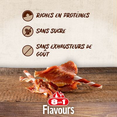 8in1 Flavours, riches en protéines, sans sucre, sans exhausteurs de goût. Friandises à mâcher visibles sur une table en bois.