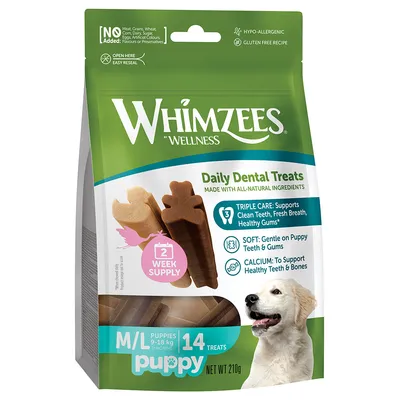 Whimzees Daily Dental Treats pour chiots M/L 9–18 kg, 14 friandises, 210 g. Sans viande, céréales, gluten ni colorants. Approvisionnement 2 semaines. Photo d’un chiot en bas à droite.