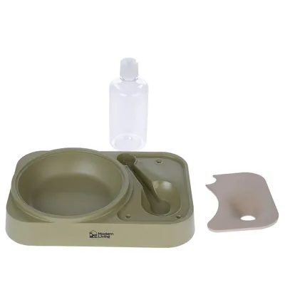 Modern Living feeding station with green bowl, drinking bottle and beige mat. Complete set for pet feeding.