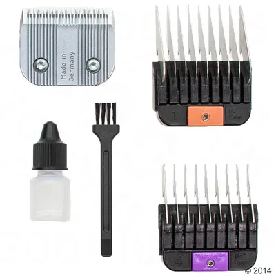 Schermesser Made in Germany, dva nastavka za šišanje (1/2 inča 15 mm i 1/4 inča 6 mm), četka za čišćenje i bočica ulja za održavanje šišača.