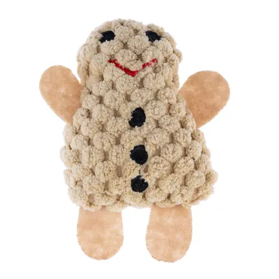 Toy in the shape of a gingerbread man made of soft fabric with textured surface, black buttons and red smile.
