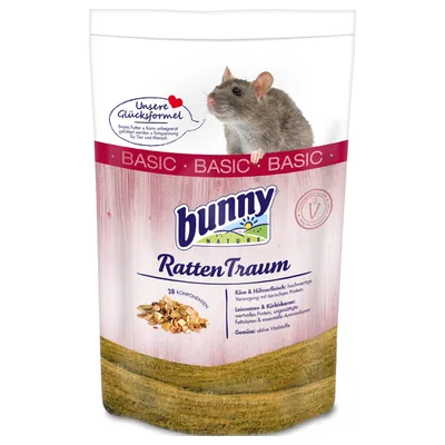 Förpackning med Bunny Nature RattenTraum BASIC, bild på råtta och blandat foder. Text: 28 komponenter, ost & kycklingkött, linfrön & pumpakärnor, grönsaker aktiva vitalämnen. Förpackning med Bunny Nature RattenTraum BASIC, bild på råtta och blandat foder. Text: 28 komponenter, ost & kycklingkött, linfrön & pumpakärnor, grönsaker aktiva vitalämnen.