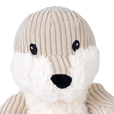 Jouet pour chien en forme d’animal, tête beige en tissu côtelé et museau blanc en peluche, yeux brodés noirs visibles.