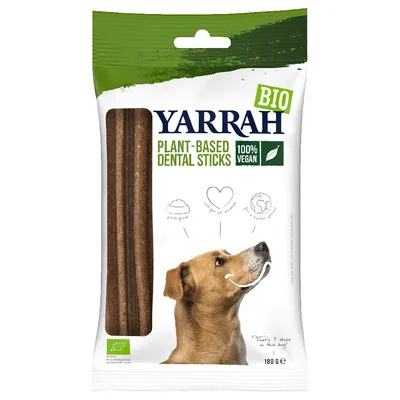 Yarrah BIO Plant-Based Dental Sticks, 100% vegan, verpakking met zichtbare sticks en afbeelding van een hond. Tekst: 'That's 7 sticks in this bag!' Inhoud: 180 g.