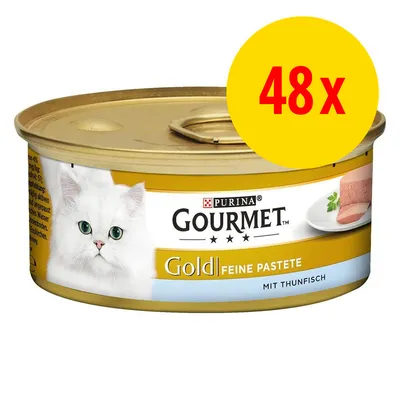Boîte Purina Gourmet Gold Feine Pastete mit Thunfisch, lot de 48. Texte en allemand sur l’emballage. Image d’un chat blanc et pâté en tranche sur une assiette.