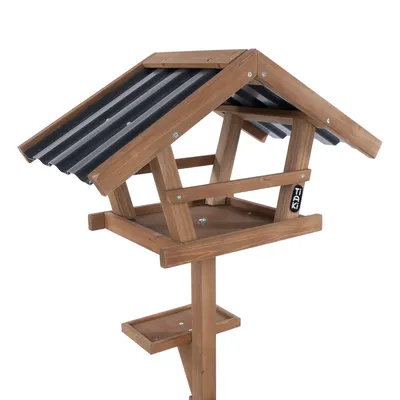 Vogelhaus aus Holz mit schwarzem Dach und zwei Ebenen, Marke Trixi sichtbar auf der Seite.