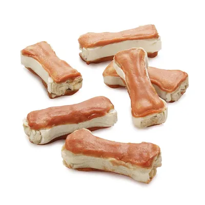 Flere tyggeben med et lag af brunt kød og hvid kerne, egnet som snack eller belønning. Flere tyggeben med et lag af brunt kød og hvid kerne, egnet som snack eller belønning.