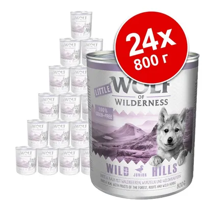 24 консерви по 800 г Little Wolf of Wilderness Wild Hills Junior, етикет с надпис 100% grain-free. Видими планински пейзаж и куче на опаковката.