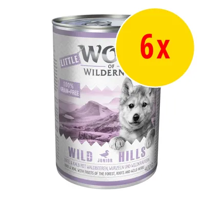 Little Wolf of Wilderness Wild Hills Junior 100% grain-free, 6x400g burk synlig. Text: Ente & Kalb mit Waldbeeren, Wurzeln und Wildkräutern. Duck & veal with fruits of the forest.