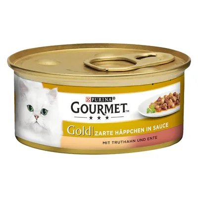 Lata de comida para gato Purina Gourmet Gold, texto visível: Zarte Häppchen in Sauce, mit Truthahn und Ente. Imagem de um gato branco e pedaços de carne em molho num prato.