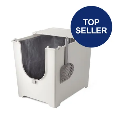 Weiße Katzentoilette mit grauer Schaufel, rechteckige Form und abnehmbarem Deckel. Blauer Kreis mit Text 'Top Seller'.