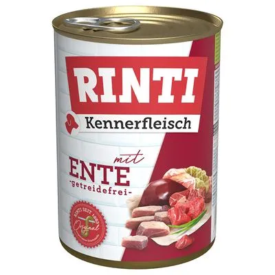 Blik Rinti Kennerfleisch mit Ente, getreidefrei. Afbeelding van vleesstukken en groente op het etiket. Tekst in het Duits zichtbaar op de verpakking. Blik Rinti Kennerfleisch mit Ente, getreidefrei. Afbeelding van vleesstukken en groente op het etiket. Tekst in het Duits zichtbaar op de verpakking.