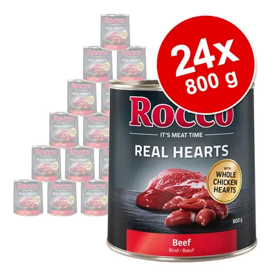Rocco Real Hearts Beef, 24 x 800 g pločevinke. Na etiketi: It's Meat Time, with whole chicken hearts. Vidna slika mesa in piščančjih src. Pakiranje več pločevink.