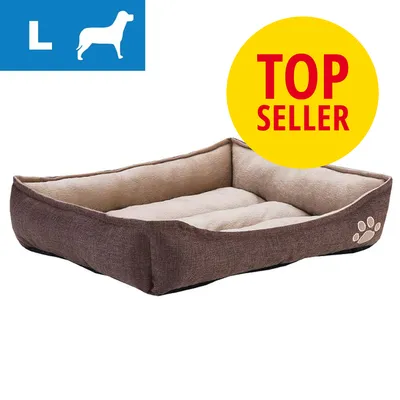 Rektangulær brun hundeseng med beige inderside, broderet pote på siden. Blå felt med hvidt L og hundesilhuet. Gul cirkel med rød tekst: TOP SELLER.