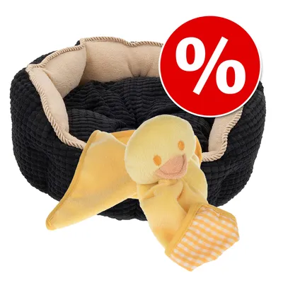 Schwarzes, rundes Haustierbett mit beigem Innenfutter und gelbem Plüschspielzeug in Entenform. Rotes Prozentzeichen für Rabattaktion. Schwarzes, rundes Haustierbett mit beigem Innenfutter und gelbem Plüschspielzeug in Entenform. Rotes Prozentzeichen für Rabattaktion.