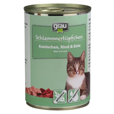 Консерва для кошек grau Schlemmer­topfchen Kaninchen, Rind & Ente. На этикетке изображён кот, кусочки мяса, значки: getreidefrei, ohne Sojaproteine.