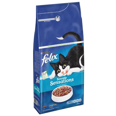 Purina felix Seaside Sensations kattenvoer, met zalm en groente, verpakking van 2 kg. Afbeelding van een zwart-witte kat en een kom brokjes op de voorkant zichtbaar. Purina felix Seaside Sensations kattenvoer, met zalm en groente, verpakking van 2 kg. Afbeelding van een zwart-witte kat en een kom brokjes op de voorkant zichtbaar.