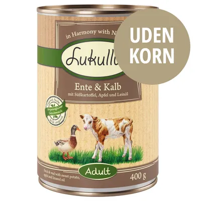 Lukullus Ente & Kalb Adult 400 g dåse, uden korn. Synlig tekst: mit Süßkartoffel, Apfel und Leinöl. Billede af and og kalv på etiketten.