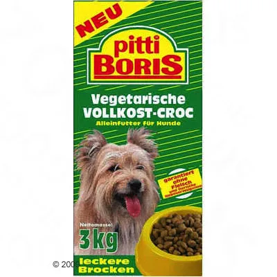 pitti BORIS Vegetarische VOLLKOST-CROC, Alleinfutter für Hunde, Nettomasse 3 kg, снимка на куче и купа с гранули. Гарантирано без месо. Текстът е на немски.