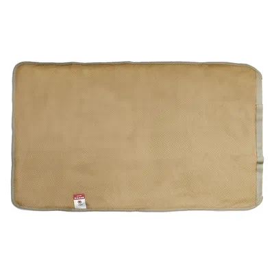 Beige matta med strukturerad yta och liten etikett nere till vänster, med röd logotyp och text: "Kühlmatte für Haustiere".