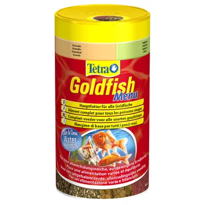Кутия с рибна храна Tetra Goldfish Menu, видими гранули, надписи: Hauptfutter für alle Goldfische, Clean & Clear Water Formula, изображение на златни рибки. Кутия с рибна храна Tetra Goldfish Menu, видими гранули, надписи: Hauptfutter für alle Goldfische, Clean & Clear Water Formula, изображение на златни рибки.