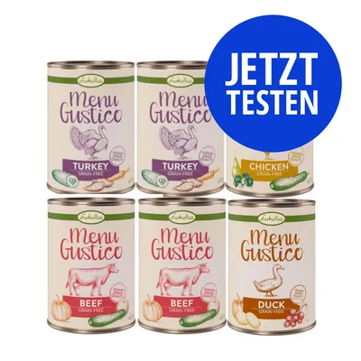 Sechs Dosen Lukullus Menu Gustico: Turkey Grain-Free, Chicken Grain-Free, Beef Grain-Free, Duck Grain-Free. Blauer Kreis mit weißem Text: JETZT TESTEN.