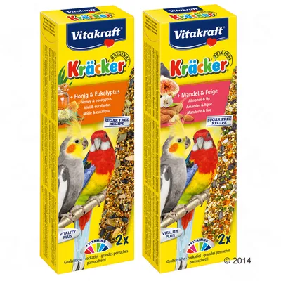 Vitakraft Kräcker, 2 opakowania: miód i eukaliptus oraz migdał i figa. Widoczne napisy: SUGAR FREE RECIPE, VITALITY PLUS, dla papug nimf i dużych papużek, 2x.