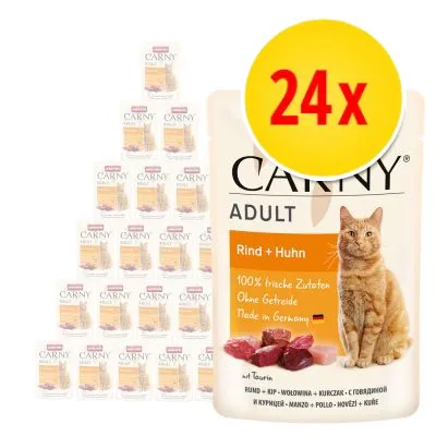 Multipack 24x Carny Adult Rind + Huhn våtfoder för katt. Text: 100% frische Zutaten, Ohne Getreide, Made in Germany. Bild på orange katt och köttbitar på förpackningen.