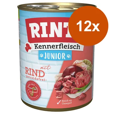 Κονσέρβα RINTI Kennerfleisch Junior με Rind, getreidefrei, πλούσια σε Omega3. Πακέτο 12x. Εμφανίζονται κομμάτια κρέατος και το σήμα Original seit 1983.