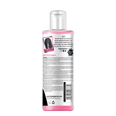 Back label of Baby Fresh Shampoo bottle showing ingredients list, usage instructions, social media icons, barcode and website address. Includes a short product story and pet image.
