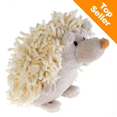 Giocattolo a forma di riccio in tessuto beige con dettagli marroni, etichetta arancione in alto a destra con testo 'Top Seller'