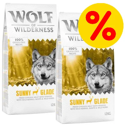 Two 12kg bags labelled Sunny Glade, 100% grain-free recipe with fresh chicken meat, venison, wild berries, roots and wild herbs. Percentage discount symbol shown.