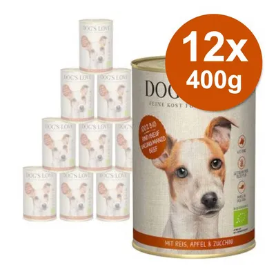 Confezione da 12 lattine DOG'S LOVE 400g, visibile scritta 'ADULT BIO RIND DEUTSCH GROUND MARZIG BEEF', con riso, mela e zucchine. Immagine di un cane sull'etichetta. Confezione da 12 lattine DOG'S LOVE 400g, visibile scritta 'ADULT BIO RIND DEUTSCH GROUND MARZIG BEEF', con riso, mela e zucchine. Immagine di un cane sull'etichetta.
